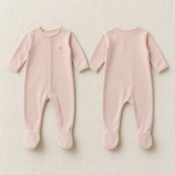 The Première Rose footie in rose poudré, front and back
